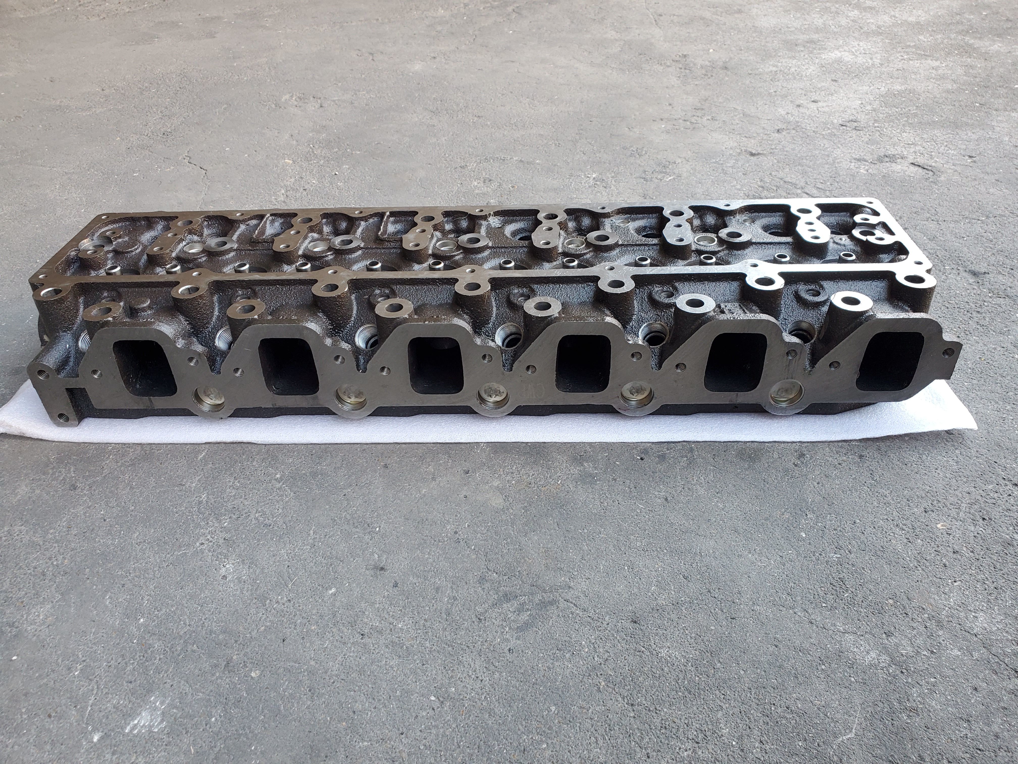 11039-06J00 Nissan Engine Cylinder Head Model TD42 Is Made Of Cast Iron