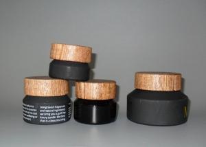 China UV Coating 50Ml Black Glass Cosmetic Bottles With Round Fat Plastic Cap on sale