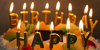 gold cake candle