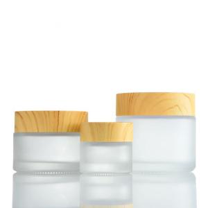 China Frosted Skincare Cosmetic Glass Bottles 15g 30g Glass Cream Jar With Bamboo Lid wholesale