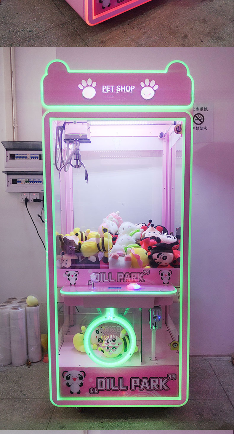 Dreamland good price for the pink color coin operated claw toys game machine for indoor game mall