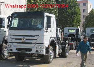 China SINOTRUK HOWO ZZ4257S3241W 6x4 Right hand drive 371HP tractor truck wholesale