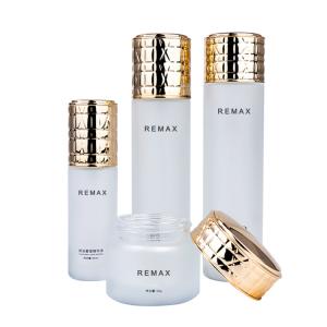 China 50g/40ml/100ml/120ml white Frosted Glass cylindrical bottle with Golden Lid for cosmetic packaging bottle wholesale