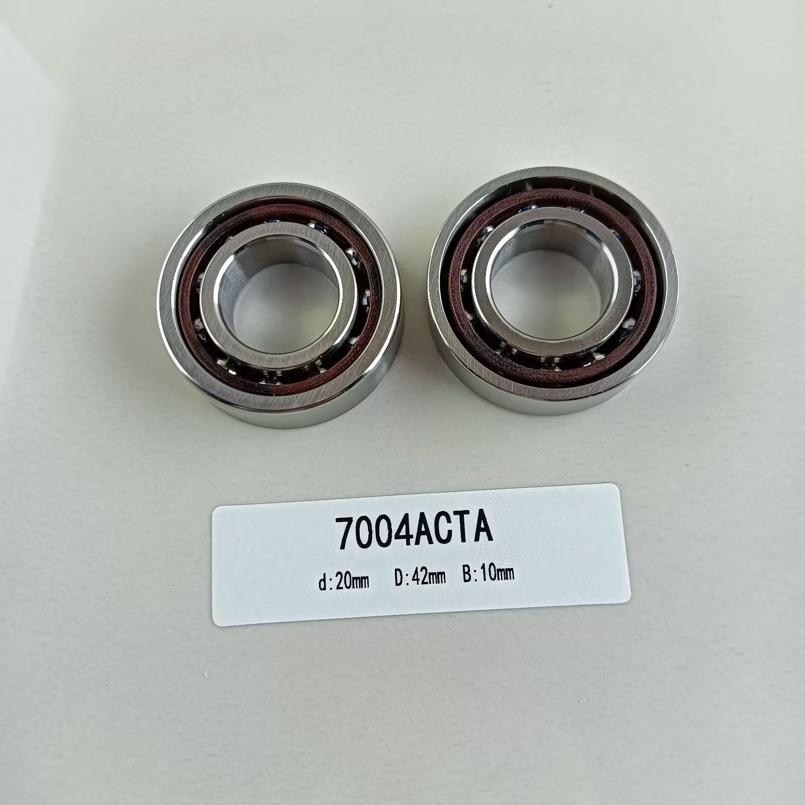 Single Row 20*42*12mm Angular Contact Ball Bearing 7004AC for Radial Load Direction