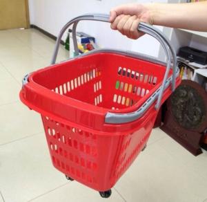 China Red Rolling Plastic Shopping Trolley Basket / Portable Storage Basket With Wheels wholesale