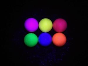 China fluorescent golf ball golf balls fluorescent golf balls in black light (glow in uv ) wholesale
