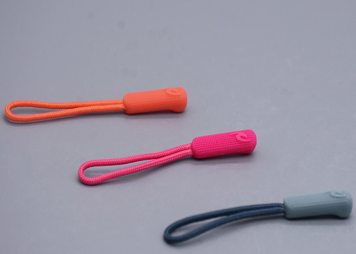 3D Embossed Plastic Zipper Puller With Polyester String For Garments