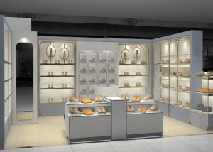 China Shopping Mall Retail Shoe Store Fixtures With Tall Cabinet And Tables Modern Style wholesale