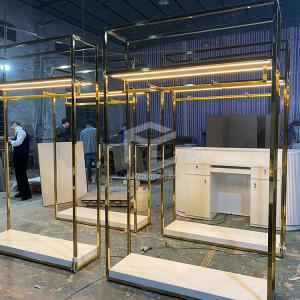 China Golden Luminous Clothing Diplay Stand For Garment Shop Furniture wholesale