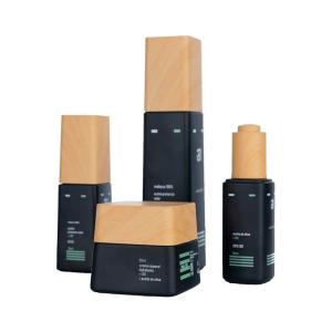 China 125ml Black Glass Skincare Glass Bottles Jars Glass Skin Care Packaging With Bamboo Lids wholesale