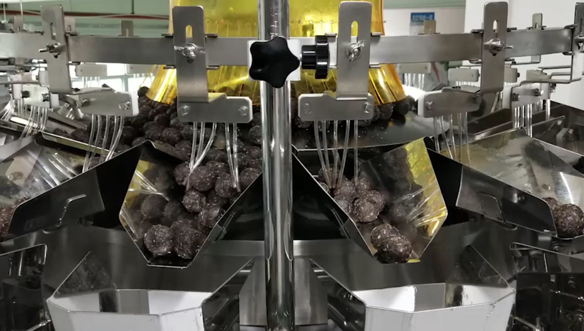 SS316 Automatic Filling Machine Chocolate Ball Weighing And Reloading Cup Code Detection System