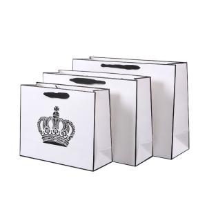 China 230GSM Shopping Holiday Gift White Custom Printed Paper Bags wholesale