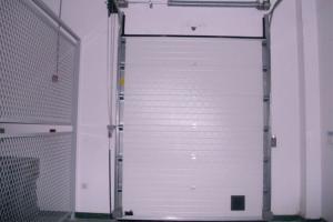 China Insulated Sandwich Panel Industrial Sectional Doors for Outside Use wholesale
