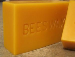 China OEM Labels Logo 1LB Yellow Solid Beeswax Block For Beard wholesale