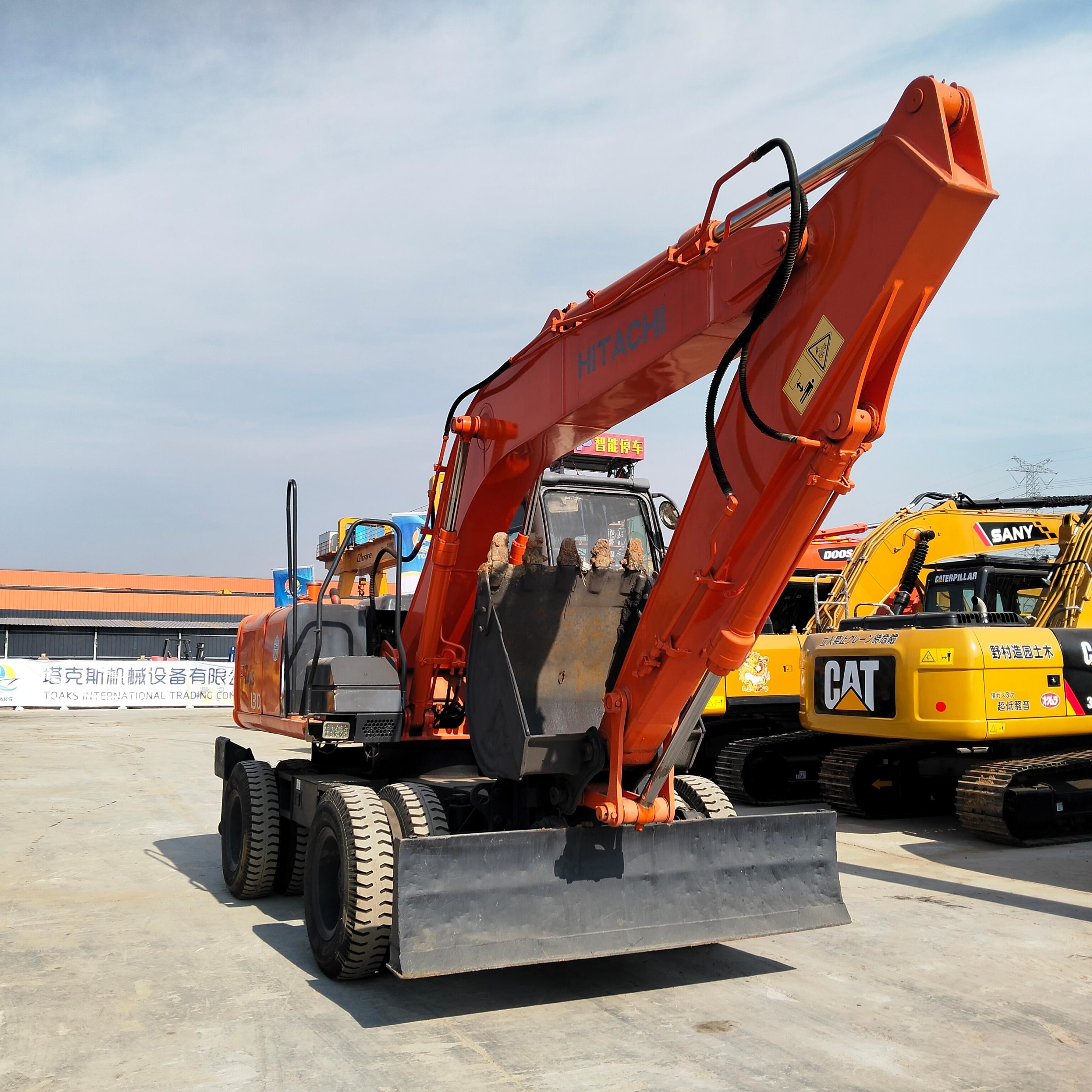 New Arrive Used Doosan Zx130W Wheel Excavator 0.6 M³ Bucket Capacity Secondhand Digger