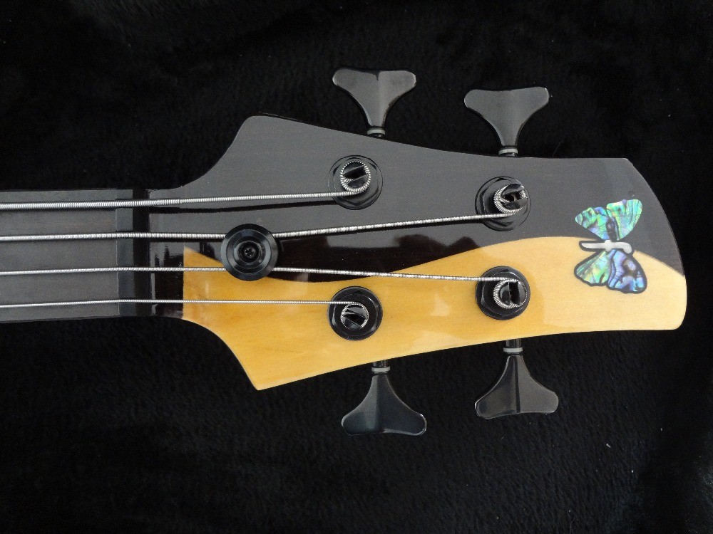 4 string bass guitar Fodera custom bass guitar Alder with flamed maple top Taiji design body MOP inlay logo