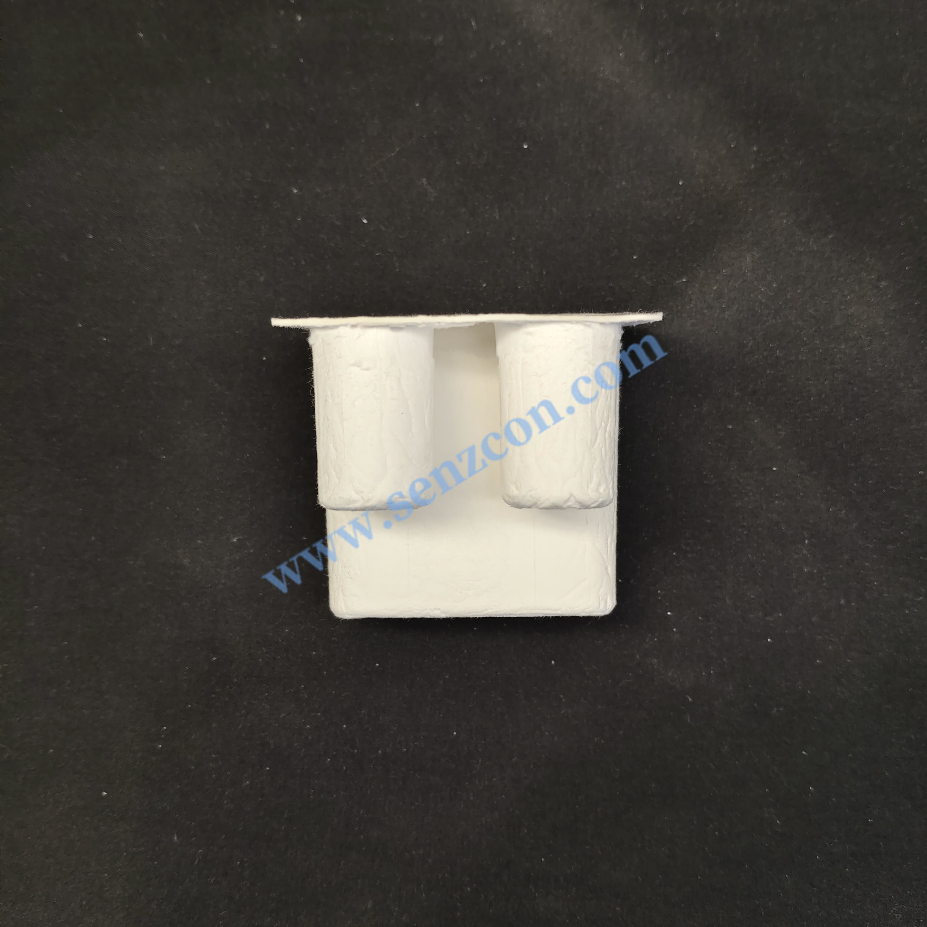 Custom-made in a Ningbo factory: Pulp molded base for electronic product earphones. Made of white plant fiber and sugarcane pulp, it is environmentall