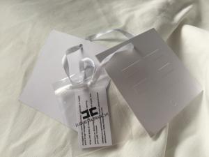 China Debossed Logo White Card Clothing Hang Tags With String Custom Size wholesale