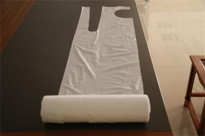 China White Disposable PE Apron On A Roll , Polythene Medical Nursing Protect Aprons wholesale