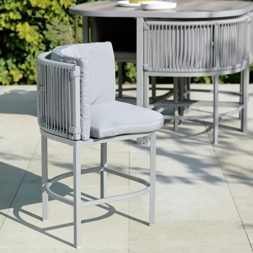 Maximize Your Outdoor Space with this Space Saving Rattan Weave and Steel Dining Set