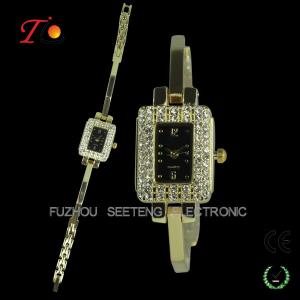 China Diamond inset case and metal band slim stone quartz watch for ladies wholesale