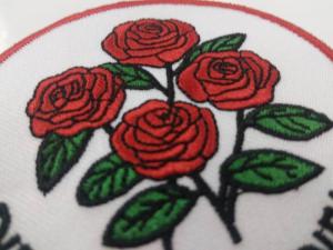 China custom design logo red rose round embroidery patch for clothing wholesale