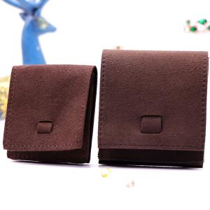 China Flap Fabric Drawstring Gift Bags Embossed Logo With Microfiber Material wholesale
