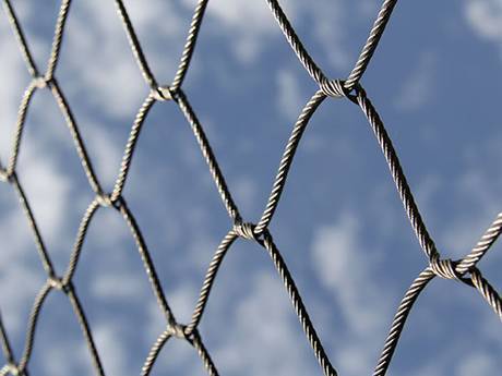 There is an interwoven wire rope mesh fencing.