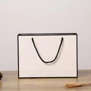 China Recyclable Kraft Paper Handbag Cardboard Rope Handle Gift Bag ISO wholesale