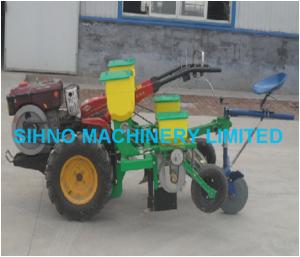 Corn seeder working with walking tractor, 2 rows