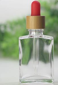 China 30ml Bamboo Cosmetic Packaging Flat Shape Glass Dropper Bottle wholesale
