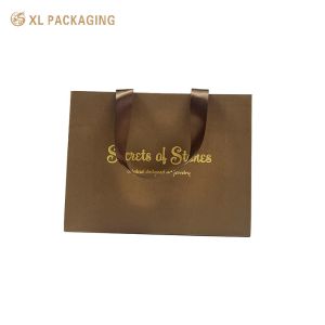 China XL Packaging Custom Packaging Factory Handmade Paper Packaging Bags Biodegradable Cosmetic Shopping Bag With Handle wholesale