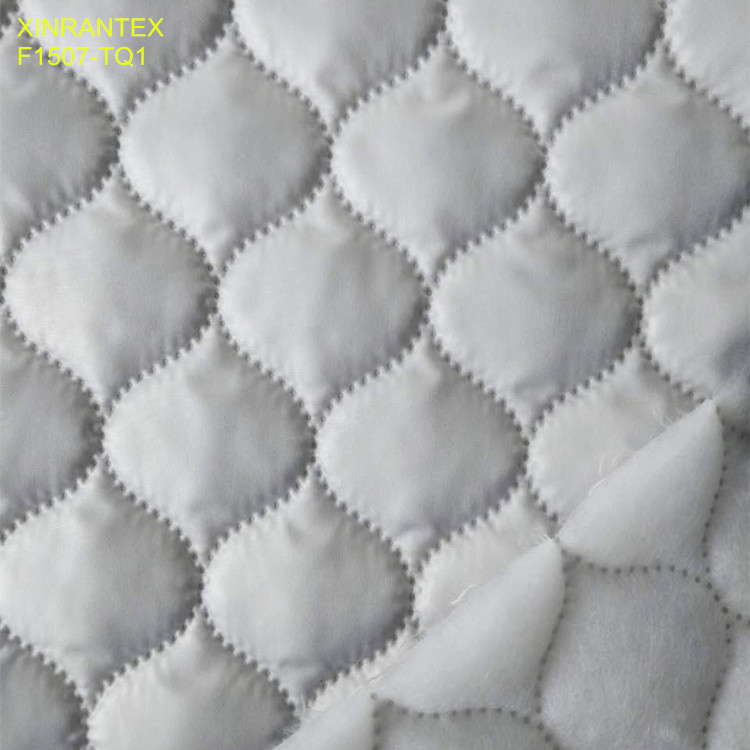 F1507-TQ1 ultrasonic embossing laminating 100% polyester termo qualiting fabric for winter heavy downcoat