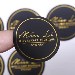 China Luxury Gold Foil Stamping Black Round Custom Printing Logo Stickers wholesale