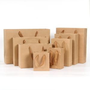 China Antiwear Moistureproof Kraft Paper Gift Bags With Handles Multipurpose wholesale