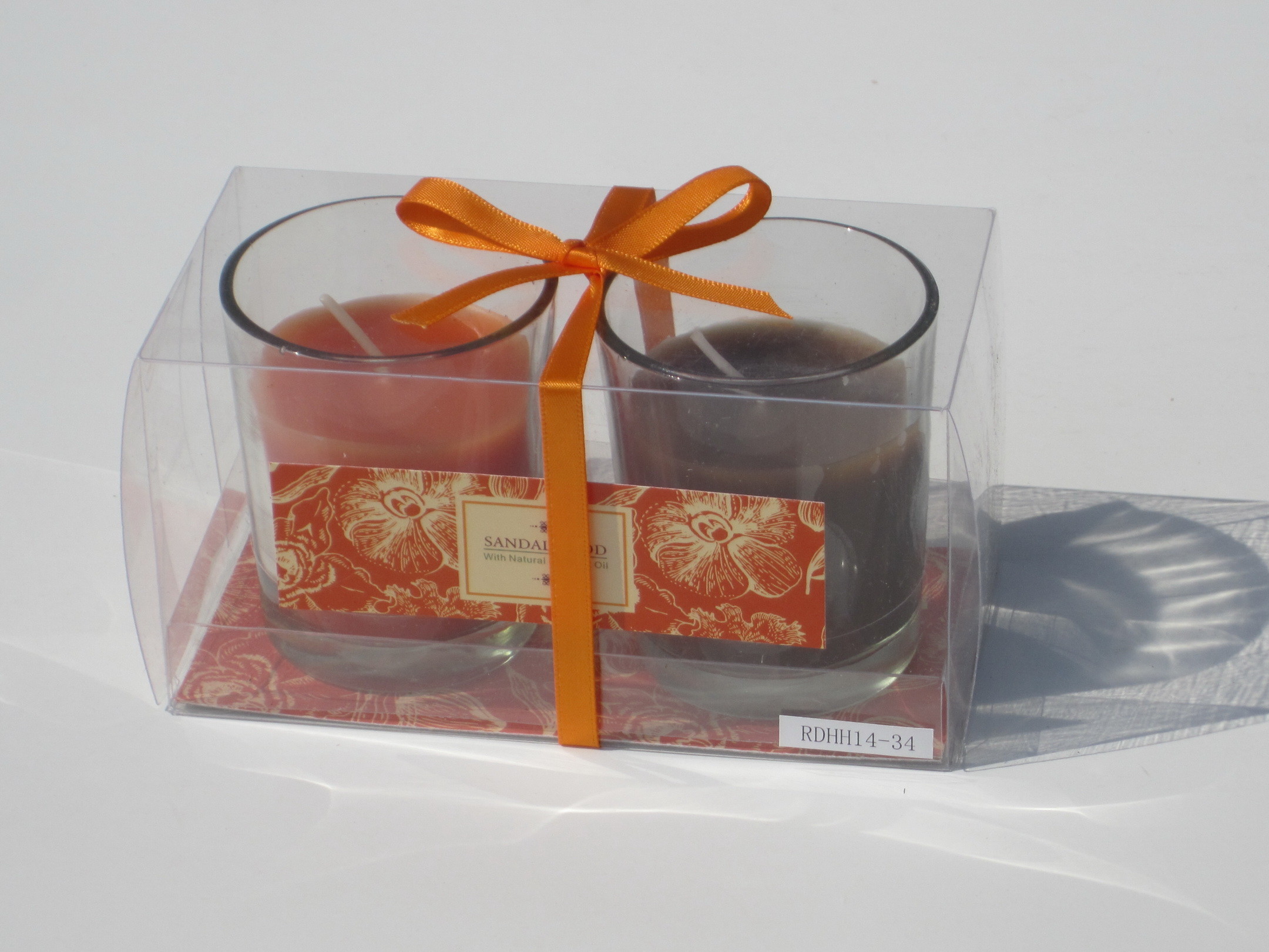 2pk Orange & Brown scented assorted glass candle with printed label,ribbon decor and packed into clear box