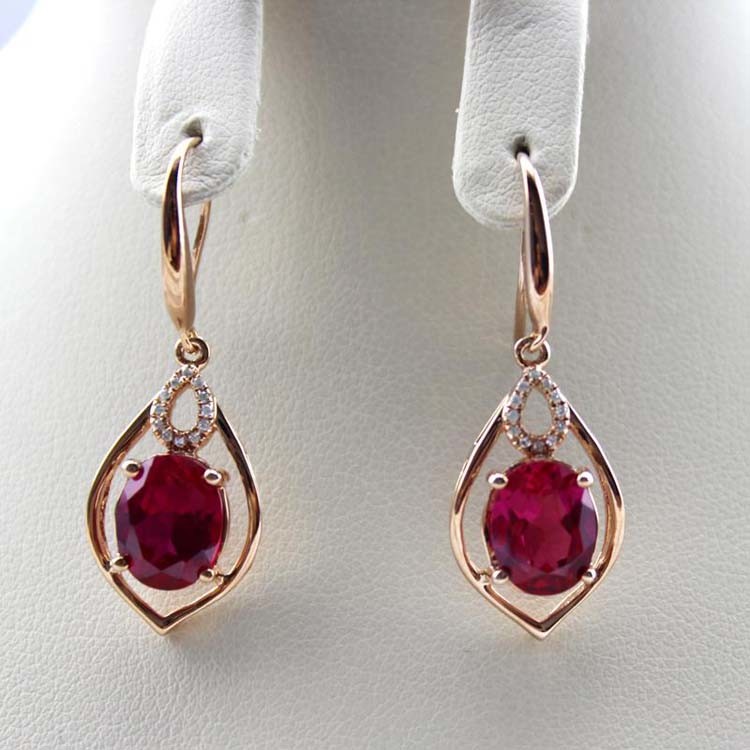 Rose Gold 925 Silver 7mmx9mm Oval Ruby Cubic Zirconia Dangle Drop Earrings (PSJ04225)