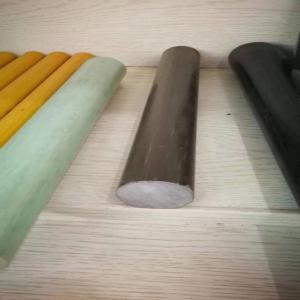 China Diameter 38mm FRP round bar of brown color made from E glass roving and Iso resin for electricity insulation wholesale
