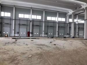China Customized Size Vertical Sectional Door Insulated Overhead Sectional Door ISO 9001 wholesale