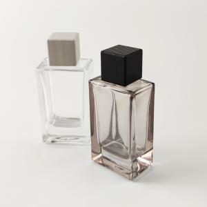 China Stylish Clear Coated Empty Glass Oil Perfume Cologne Bottle With Wooden Cap wholesale