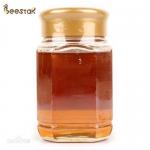 China Organic Turbid Smell 1500g Natural Bee Honey Amber Color Jujube Honey for sale