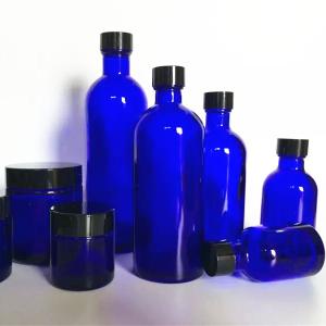 China Eco Friendly 30ml Glass Boston Bottles Purple With Screw Caps wholesale