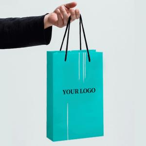China Customized High-end Hand held Gift Bags Clothing Store Personalized Craft Kraft Paper Bags Gift Packaging wholesale