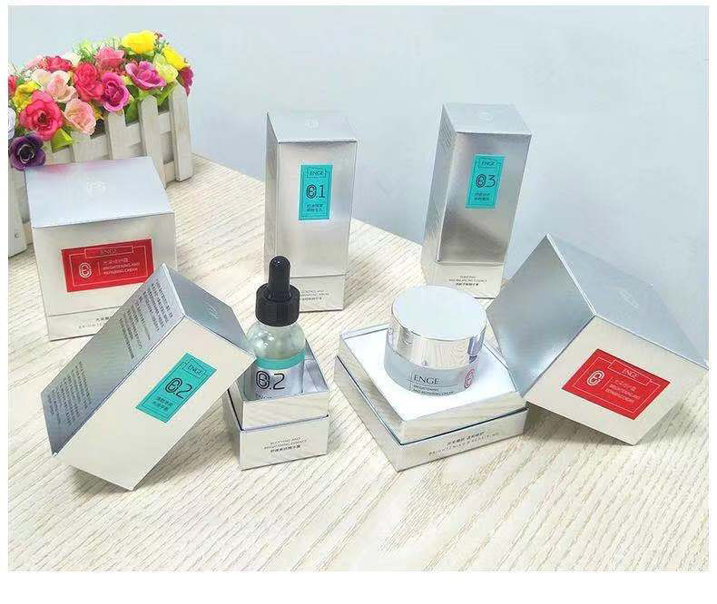 Factory supplying customized silver paper cosmetics essence packaging boxes