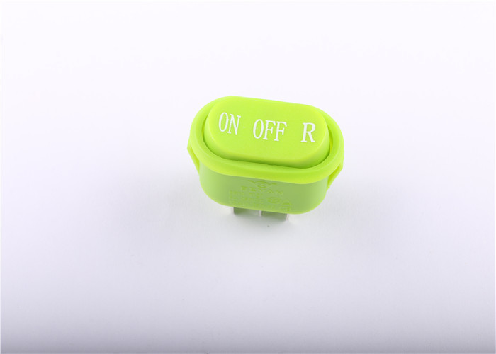 Oval Shaped Green Industrial Rocker Switch , Waterproof On Off On Rocker Switch
