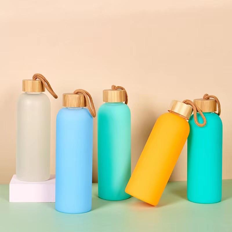 Premium 500ml 750ml Glass Water Bottle Custom Sports Drink Bottles With Silicone Sleeve Stylish And Practical For Any Indoor And Outdoor Daily