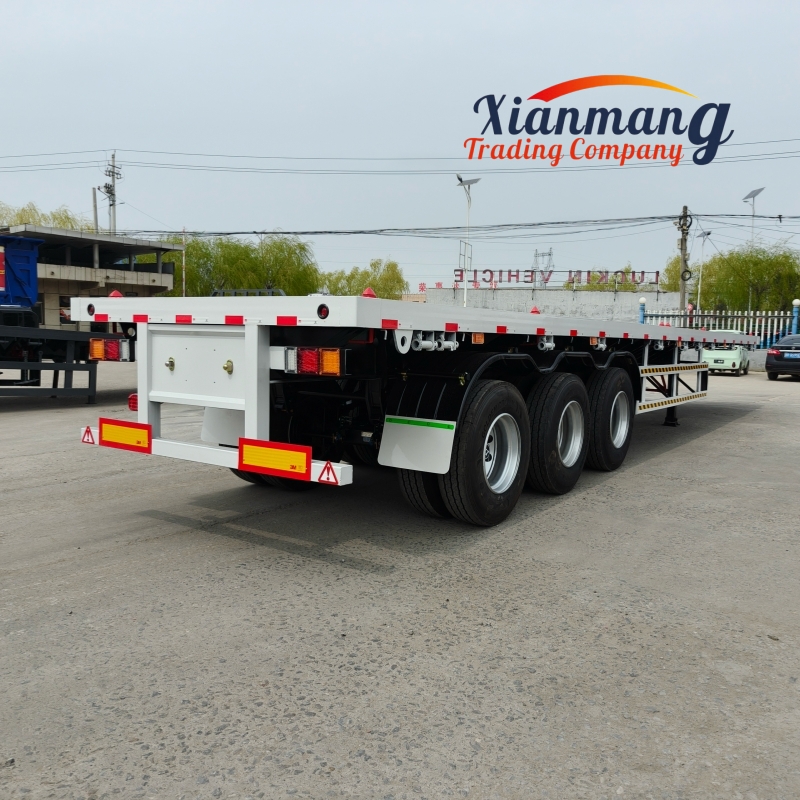 Xianmang Group 3 And 4 Axles 20ft 40ft Container Flat Bed Flatbed Semi Trailers For Tanzania And Kenya