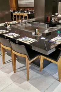 China 7 Seats Induction Heating Electric Teppanyaki Table Grill Stainless Steel and Alloy Steel wholesale