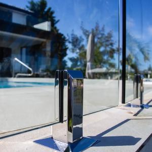 China Frameless Glass Railings With Stainless Steel Spigots For Fence Balconies Staircase Patios wholesale