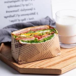 China 40gsm-50gsm Unbleached Printed Greaseproof Paper Cheese Butter Wrapping Paper wholesale